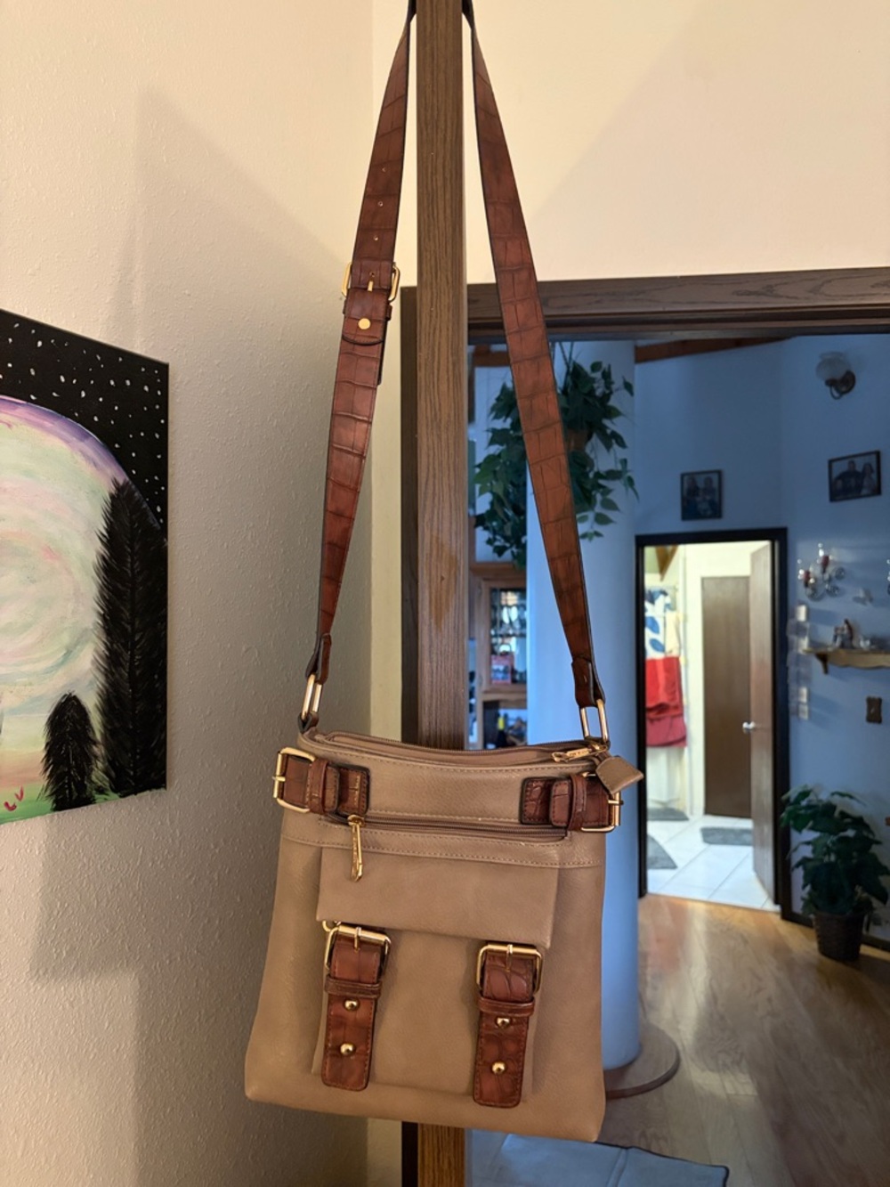 Beige Crossbody Messenger Bag with Brown Trim and Adjustable Strap